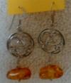 Silver celtic design earrings with amber